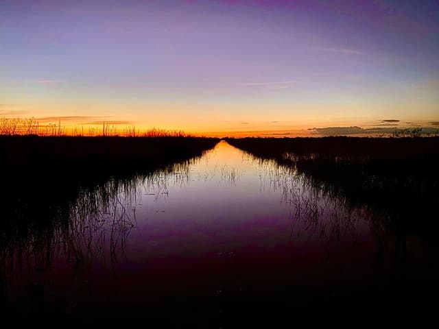 sunset view of everglades marsh